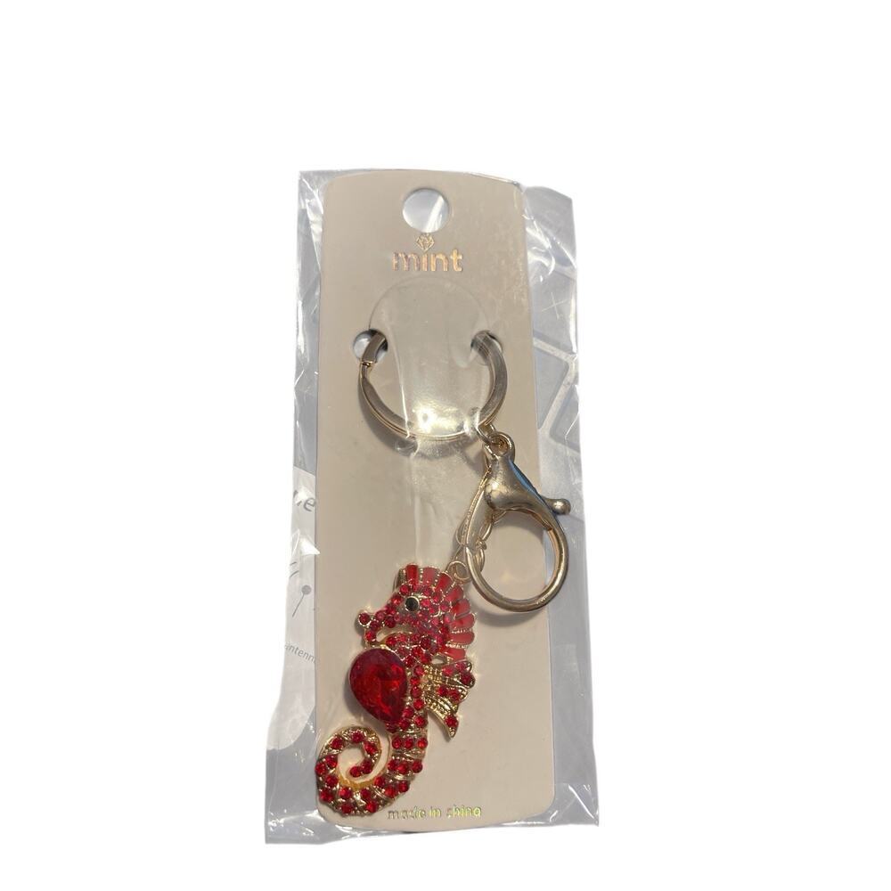 GOLD PLATED KEYCHAIN OF A RED SPARKLES OF A SEA HORSE
